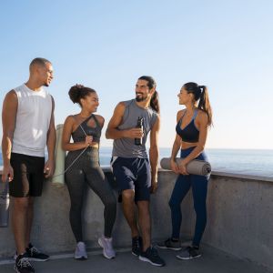 group-people-exercising-together-outdoors copia